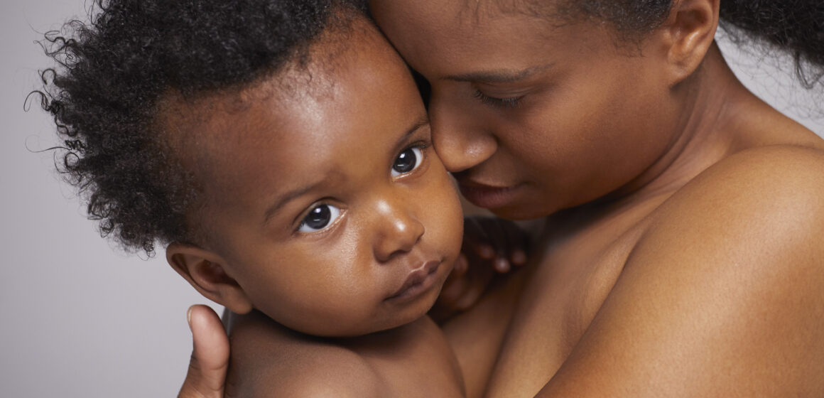 mother embracing her baby with love and care